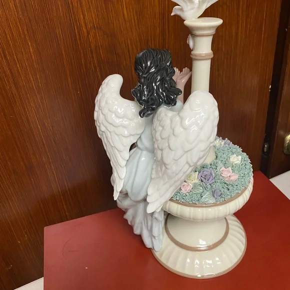 Grandeur Noel Porcelain Angel sculpture in fountain